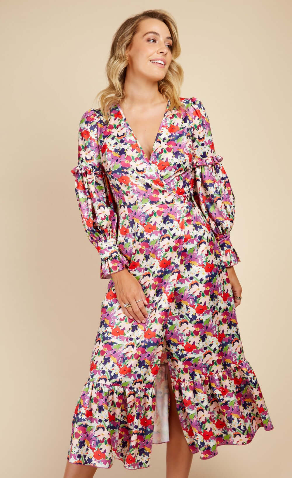 Floral Satin Wrap Dress with Peplum Hem featuring vibrant blooms and voluminous sleeves.