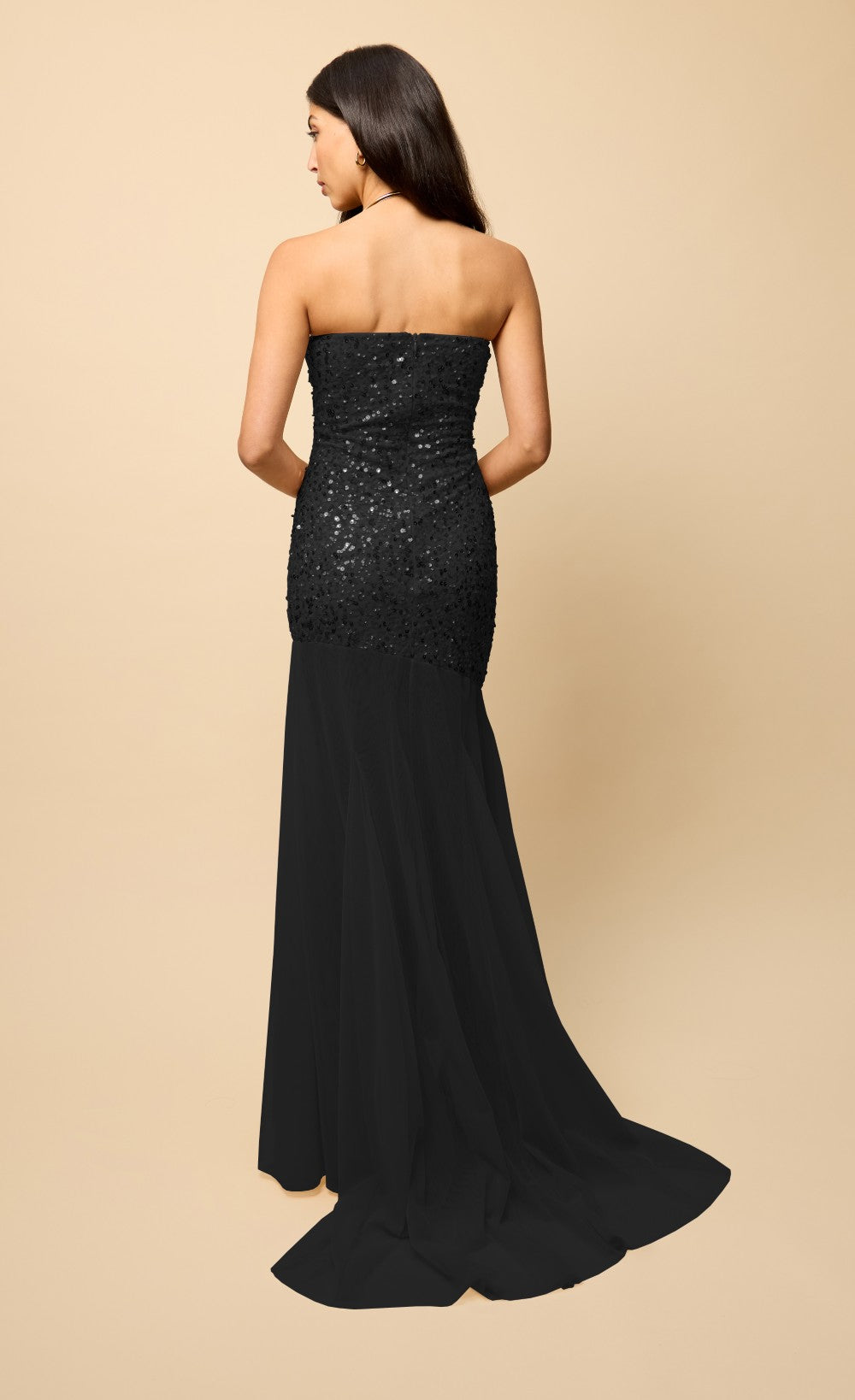 Harlow Black Mesh Train Embellished Maxi Dress showcases a back view of the sparkling bandeau design and flowing mesh train.