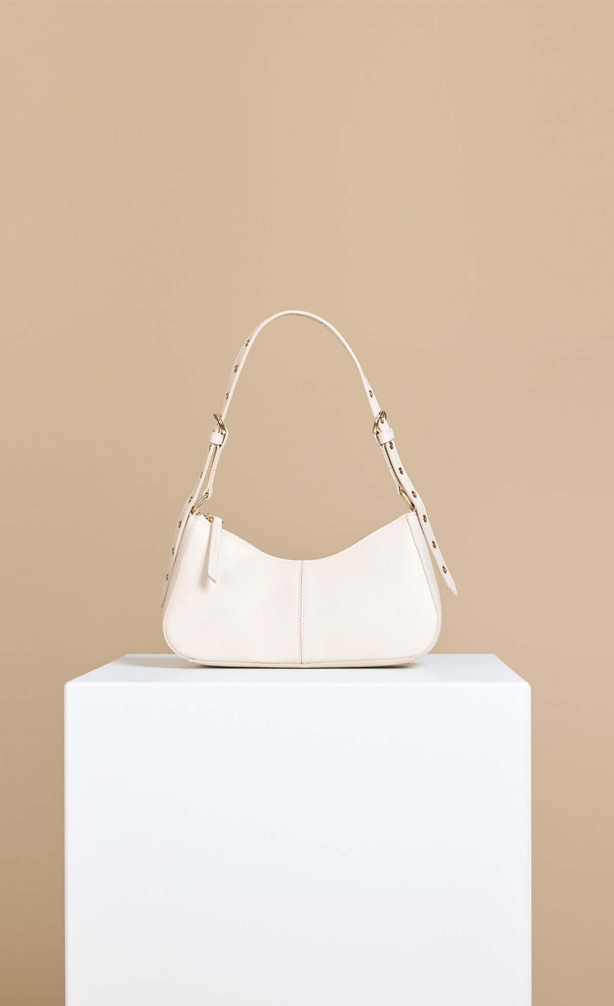 Stone Curved Top Shoulder Bag featuring a sleek design and adjustable strap, perfect for stylish outings.