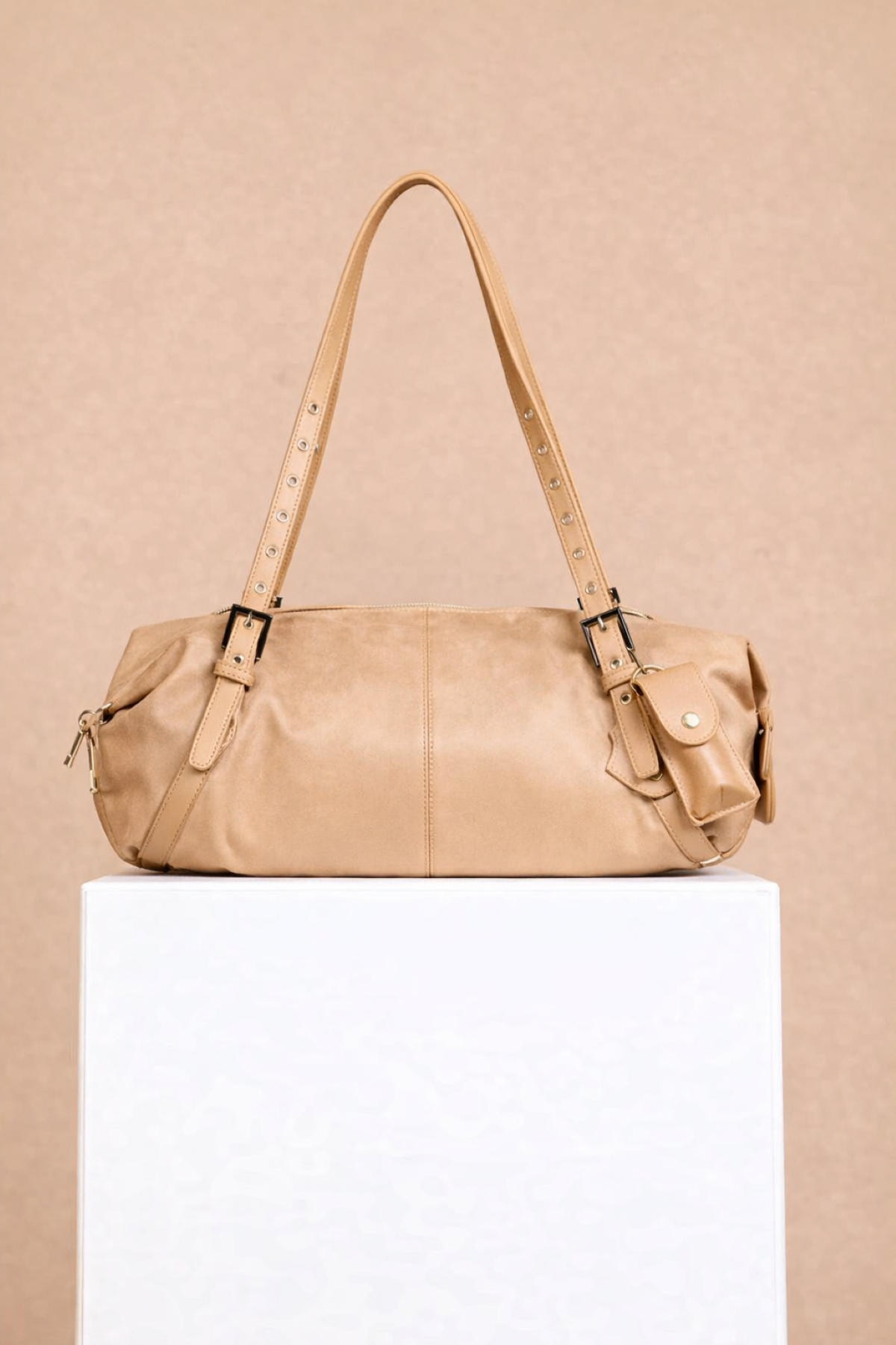 Camel Faux Suede Shoulder Bag with eyelet strap in soft camel color and gold trims.