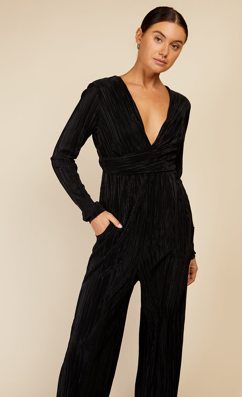Black Plisse Jumpsuit by Vogue Williams