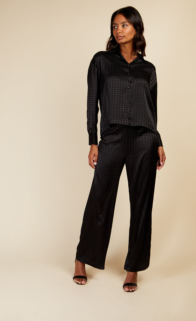 Black Satin Houndstooth Trousers by Vogue Williams