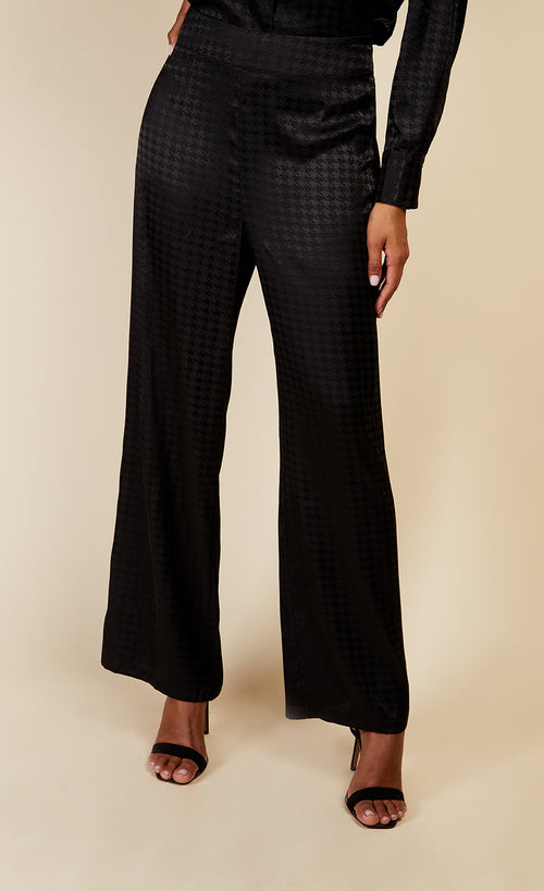 Black Satin Houndstooth Trousers by Vogue Williams