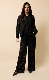 Micaela Black Lace Shirt styled with matching trousers, featuring elegant lace design and classic turn-down collar.