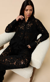 Micaela Black Lace Shirt worn by a model, featuring elegant black lace and a classic collar for versatile style.