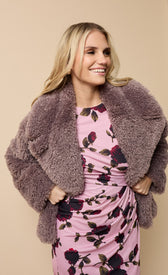Mink Faux Fur Jacket worn over a floral pink dress, showcasing its luxe softness and stylish design for winter fashion.