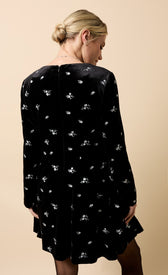 Sondra Black Velvet Embroidered Mini Dress showcasing back view with intricate floral embroidery on black velvet.