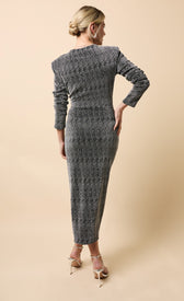 Back view of a woman wearing the Sylvie Black and Silver Cowl Neck Midaxi Dress, showcasing its elegant design.