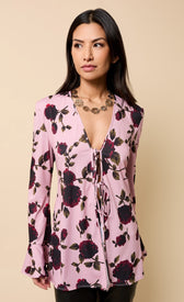 Naelle Multi Floral Print Tie Detail Top in pink with long sleeves and V-neckline, perfect for autumn wear.