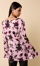 Naelle Multi Floral Print Tie Detail Top showcasing a model wearing a floral print with a flattering V-neckline and tie detail.