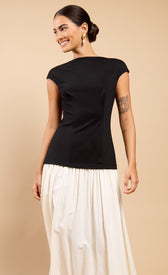 Amoura Monochrome Dropped Waist Maxi Dress showcased on model, featuring short sleeves and elegant silhouette.