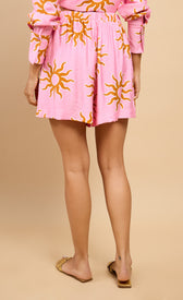 Arabella Pink Sun Print Shorts Vicky Pattison EDIT featuring vibrant pink sun patterns, perfect for sunny outings.