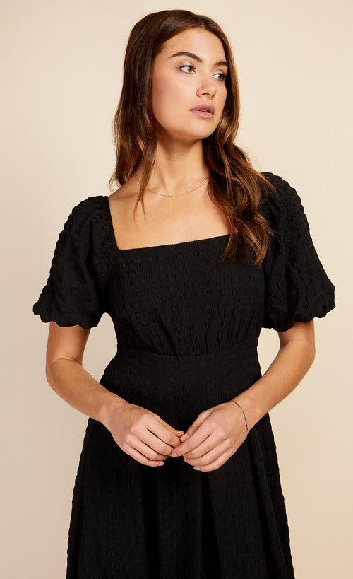 Black Texture Puff Sleeve Midaxi Dress by Vogue Williams