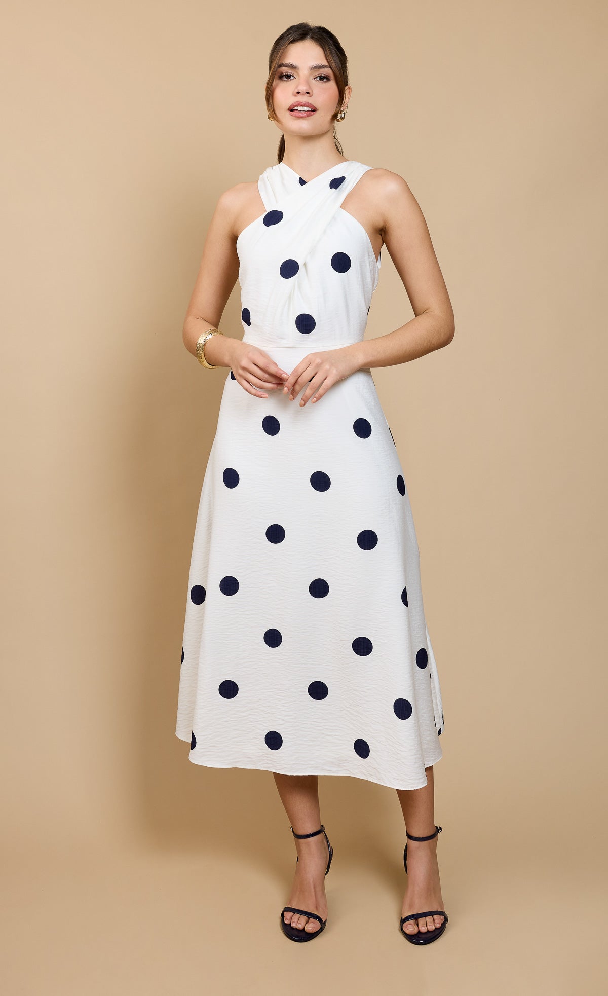 Spot Print Halter Midaxi Dress by Vicky Pattison displayed on a model, featuring a stylish spot pattern and elegant silhouette.